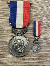 médaille + réduction