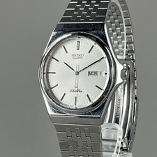 Montre homme vintage SEIKO Silver Wave 35 mm à quartz jour / date 5933-7000