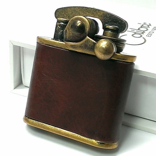 Briquet huile colibri - à,
