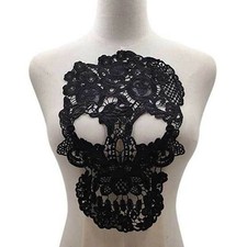 Broderie tête mort - tête,