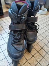 T41 femme Rollers OXELO noirs peu utilisés