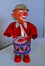 Clown mécanique automate joue du tambour