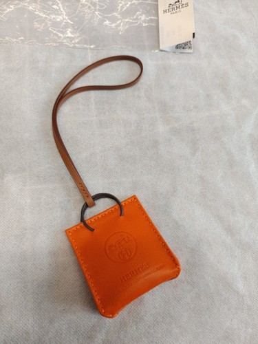 Hermès sac orange charm - hermès,