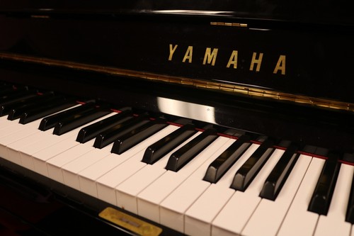 Upright black yamaha piano - yamaha,