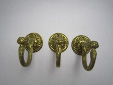 SUITE DE 3 APPLIQUES EN BRONZE