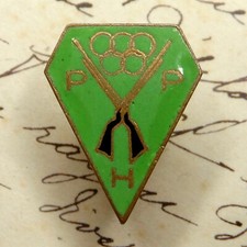 Insigne Sportif, Broche émaillée. Fusil, Tir, Anneaux Olympique.  A identifier.