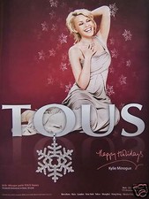 PUBLICITÉ PAPIER KYLIE MINOGUE PORTE TOUS SNOWY PENDENTIF DIAMANT EN OR