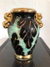 beau vase  en céramique  signé pugi  