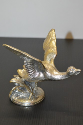 Belle mascotte bronze argente - belle,