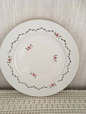 ancien plat rond en faïence "