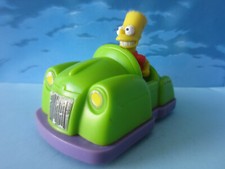 FIGURINE BART SIMPSON EN VOITURE QUICK 1998 -  +/- 9cm(L) x 6cm(l) x 6,5cm(H)