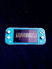 Nintendo Switch Lite turquoise d'occasion COMME NEUVE +coque +housse +chargeur