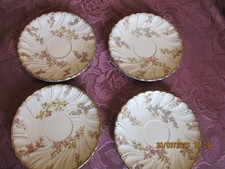Lot de 4 anciennes sous-tasses