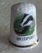 Dé à coudre de collection en porcelaine décoré d'un blaireau