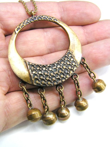 Pendentif bronze coulé - en,