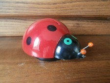 TIRELIRE EN BOIS COCCINELLE