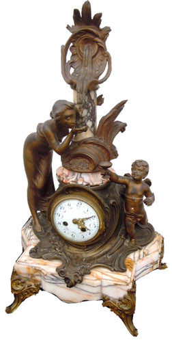 Pendule décor femme angelot