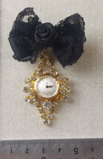 Ancienne montre broche
