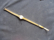 ++"503.11"   MONTRE ANCIENNE FEMME EN METAL DORE MARQUE PHILIPPE