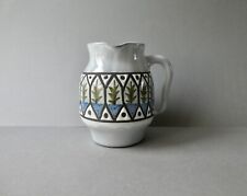 pichet en céramique signé