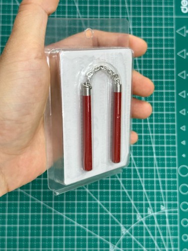 Scale red metal nunchakus - scale,