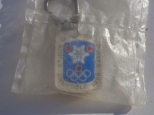 PORTE CLE Jeux Olympiques GRENOBLE 68  VITESSE encore avec son emballage fermé