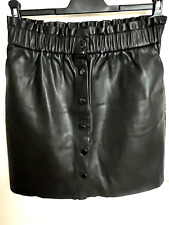 JUPE PROMOD NOIRE BOUTONNAGE DEVANT POLYURETHANNE TAILLE 38/40 COM9