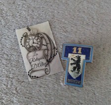 Insigne / pucelle 11 e