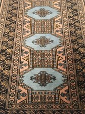 Tapis Boukhara signé