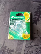 Tétines neuves, Bébé