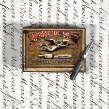 Boîte de plumes ancienne « La Renommée »