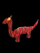 Dinosaure tissu rouge peluche