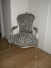 Fauteuil motif zèbre - restauration tapissier 