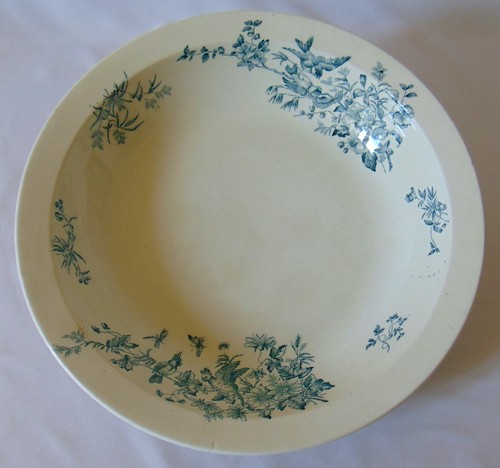 Plat rond creux faience - un,