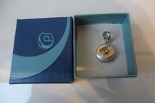 Pendentif Pierre Lang, Beau