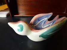 Vide poche oiseau - , en