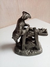 sculpture etain massif