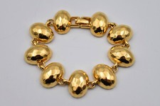 Bracelet vintage Trifari en métal doré effet martelé