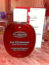 COLLECTOR : Eau Dynamisante Clarins - Grand Flacon VIDE 1 Litre en verre rouge.