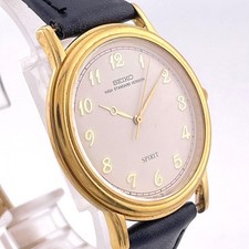 Montre-bracelet pour homme SEIKO SPIRIT à quartz ton or pile fine neuve