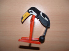 KINDER Perroquet noir sur perchoir rouge très bon état.