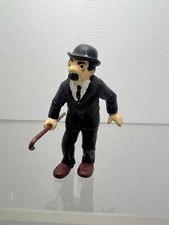 Figurine dupont avec canne