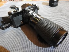 BOITIER NIKKORMAT FTN NOIR ANNÉES 60 AVEC AUTO ZOOM MAGNON 75-200mm  ET DOUBLEUR