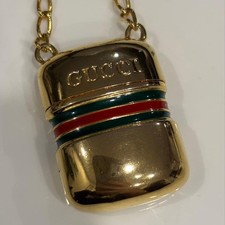 Collier pendentif pilule Gucci