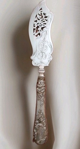 Pelle où couteau à - ,