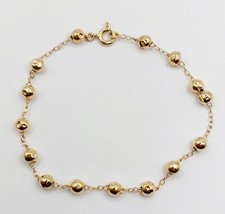 Bracelet vintage or 18k maille marseillaise et billes d'or sur une chaine