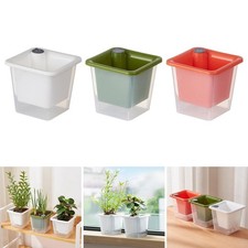 Pot de fleurs auto-arrosant