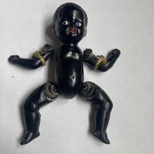 Ancien poupon noir - , en