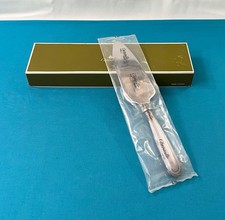 NEUF pelle a tarte coupante