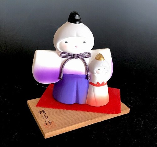 Mother and daughter figure - daughter, by